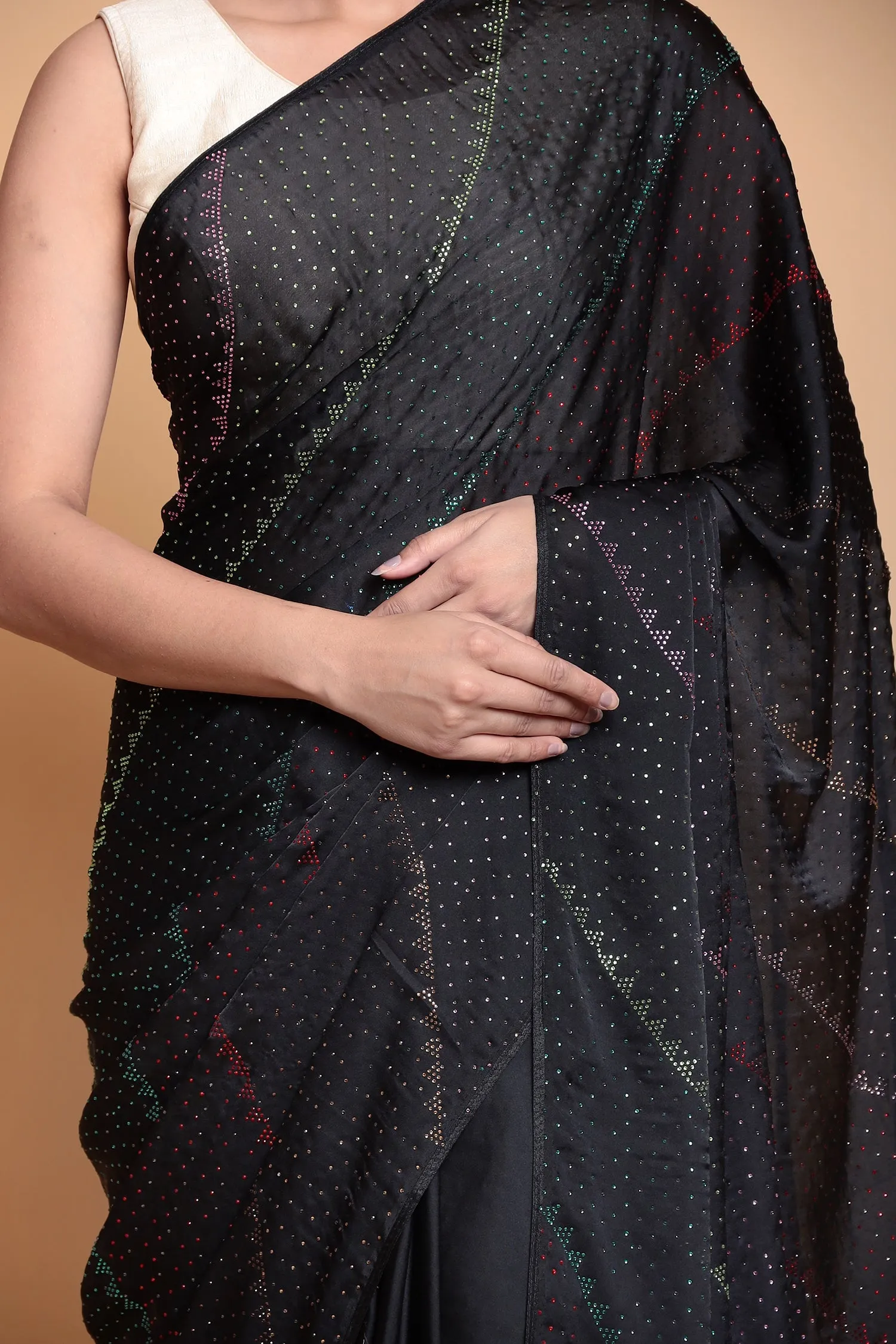 Crape Silk Saree with Swarovski work.