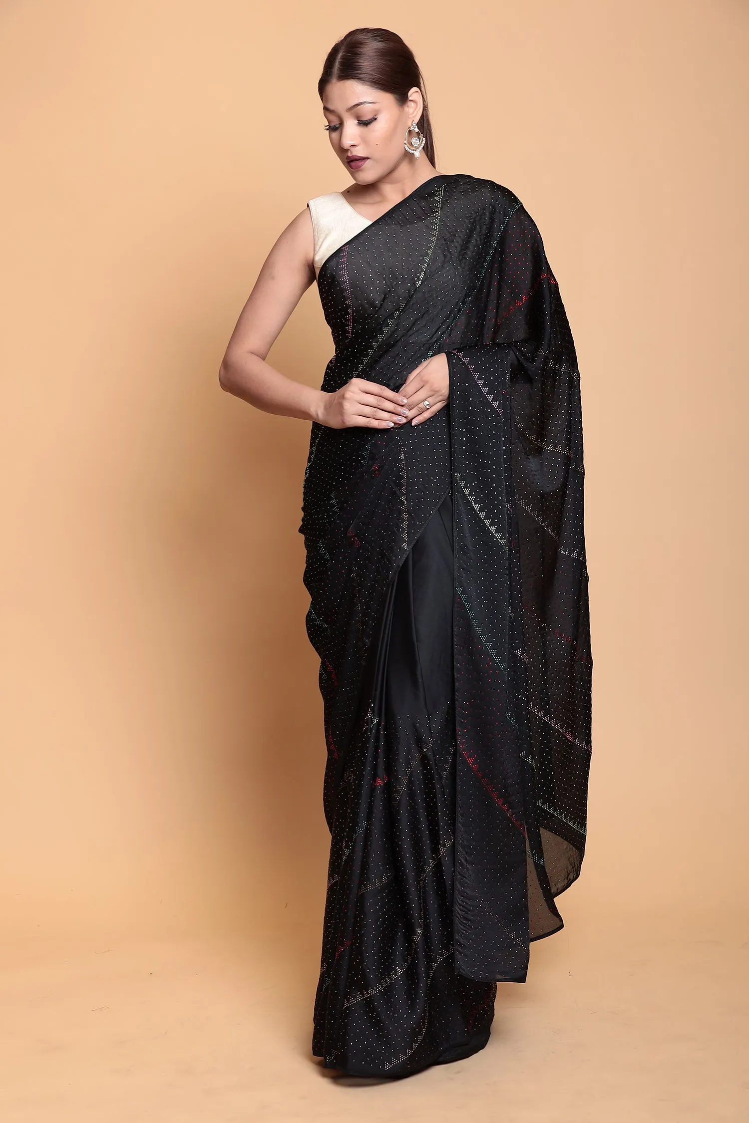 Crape Silk Saree with Swarovski work.